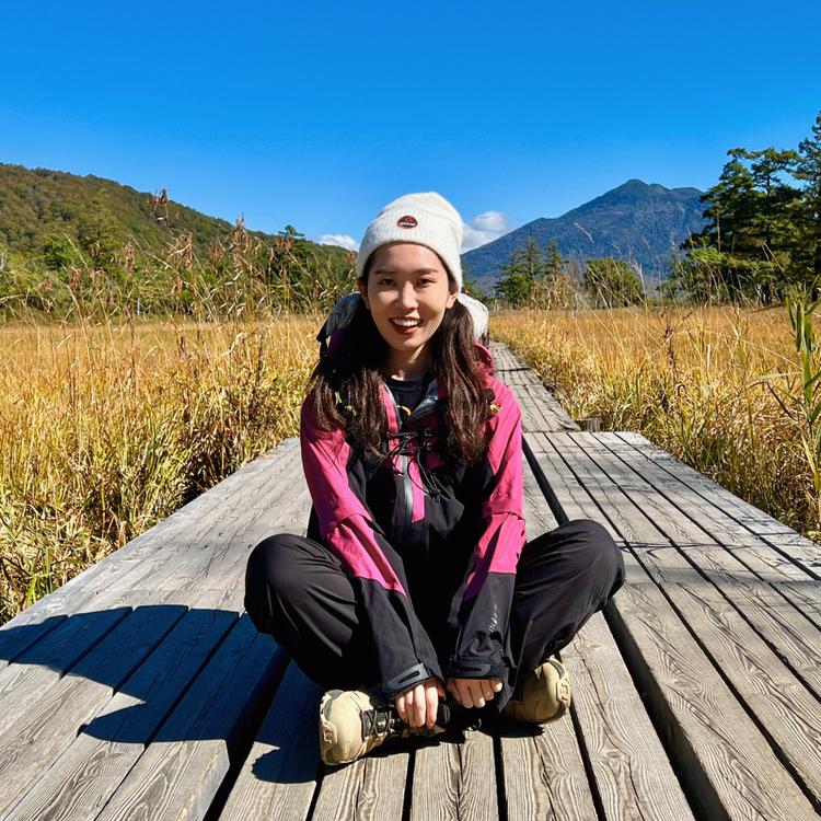 Yuka profile photo with mountain view